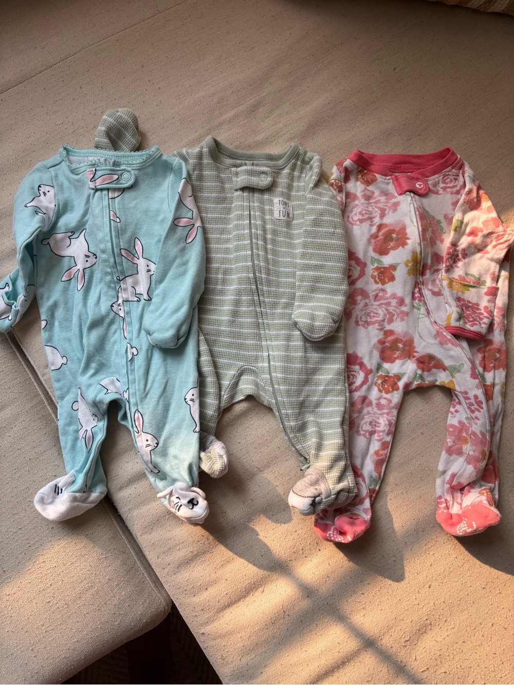 Newborn footed onesies